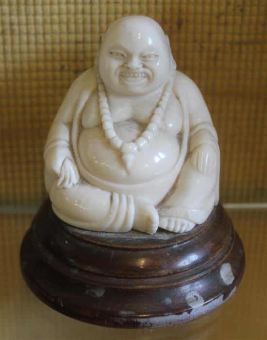 Chinese ivory seated figure of Budai, early 20th c